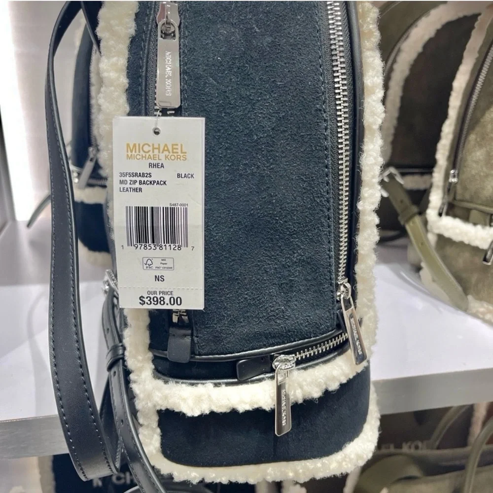 Michael Kors black and Cream Backpack is leather/ fur is faux new bag - Picture 5 of 11
